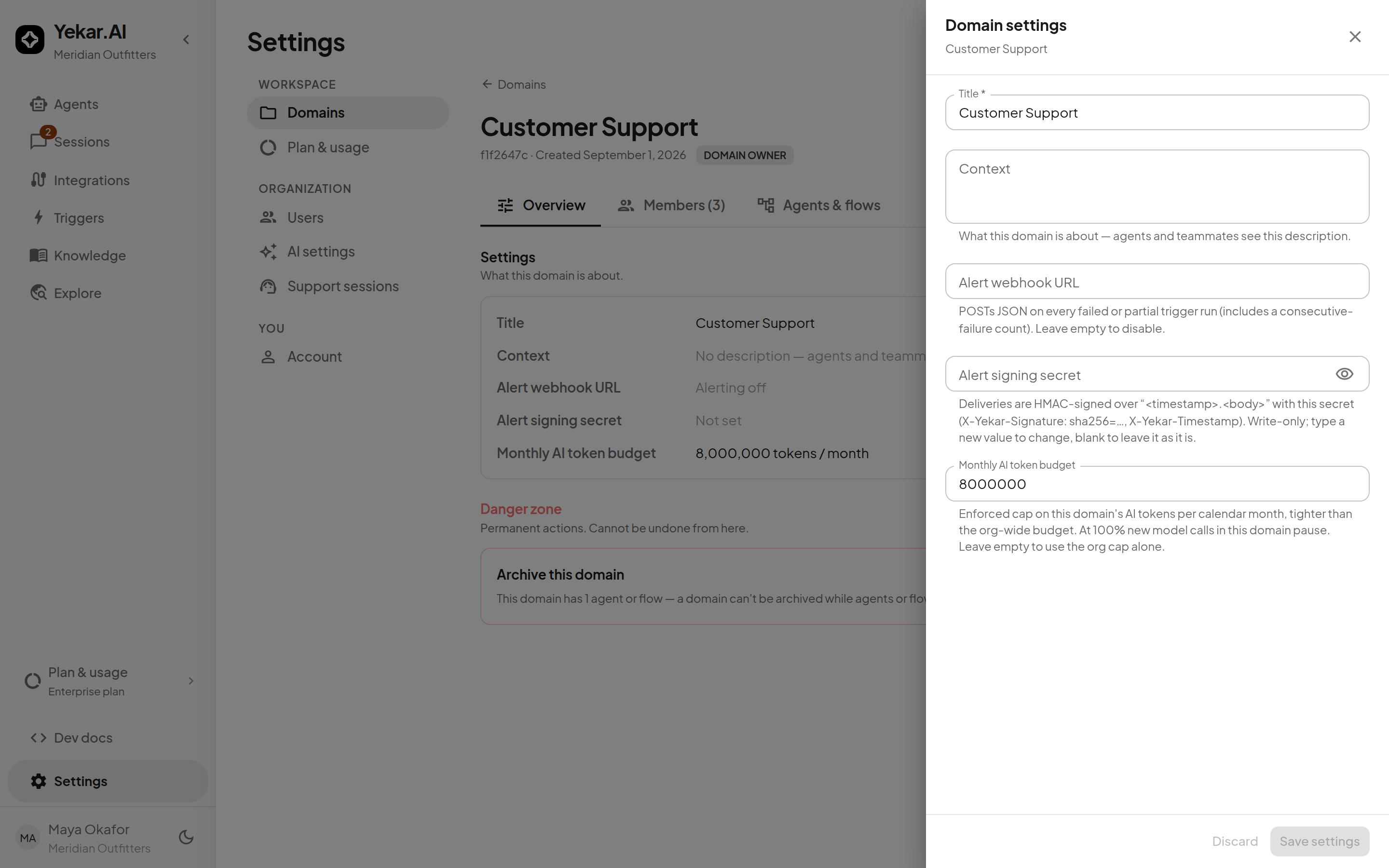A domain's settings drawer with the alert webhook URL and the write-only signing secret