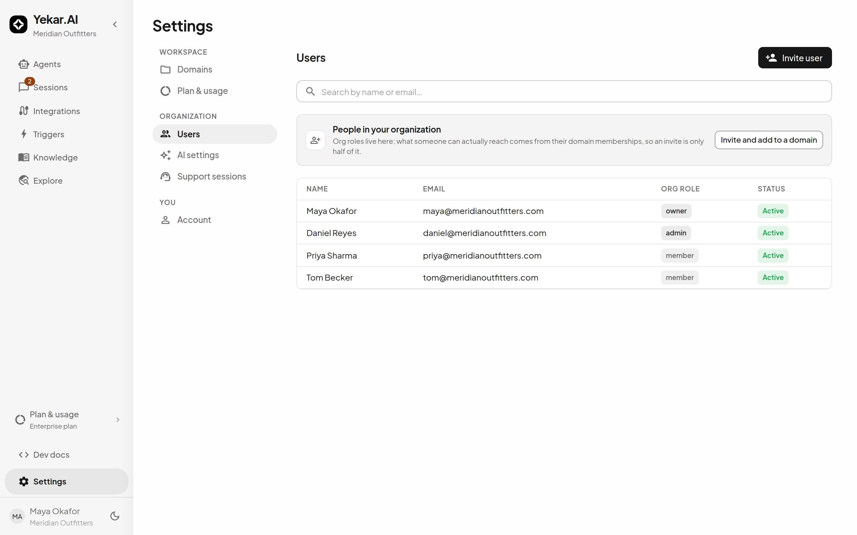 Settings → Users: members with their organization roles and status